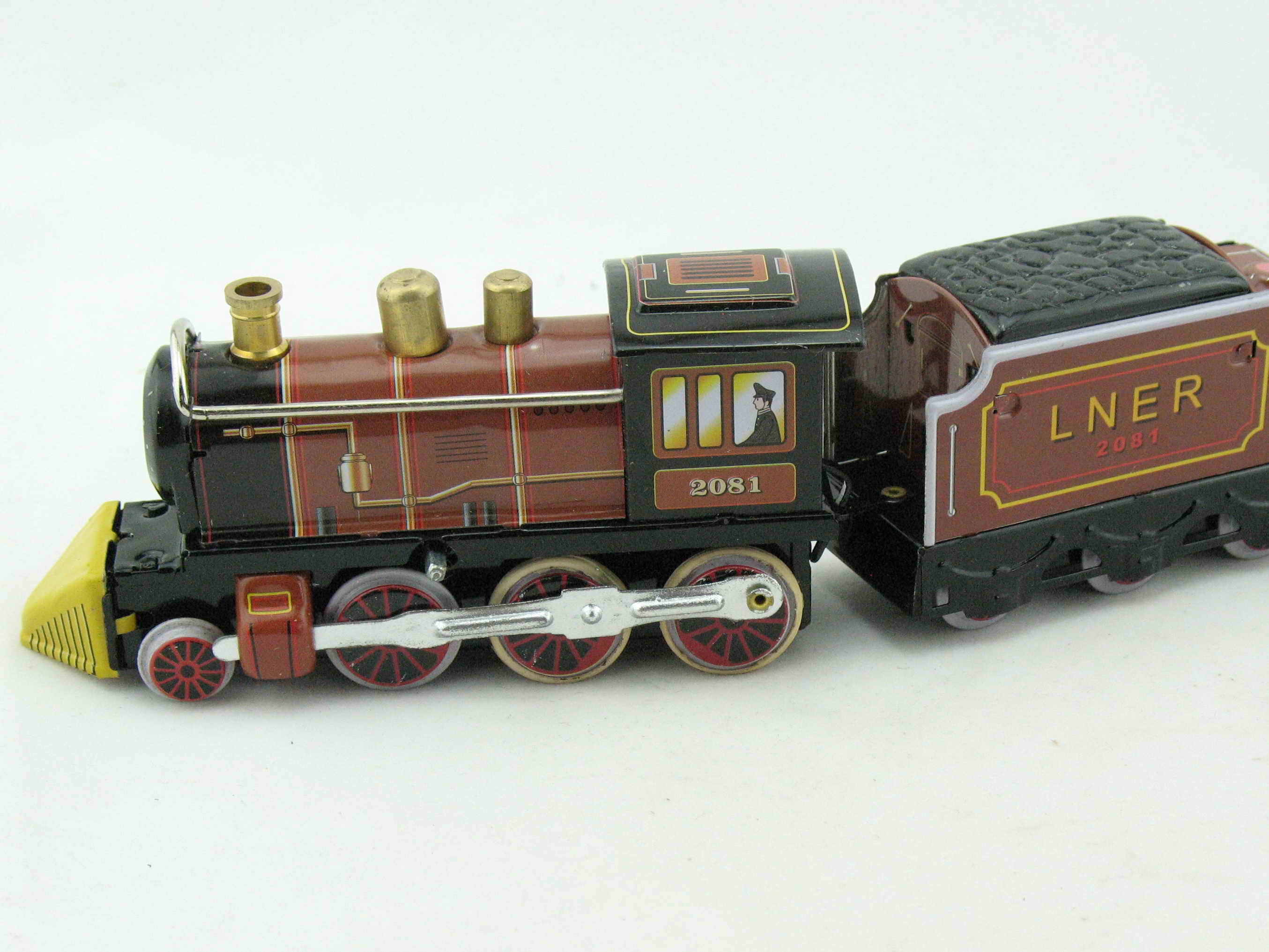 Blechspielzeug - Dampflok mit Tender und Personenwagen braun