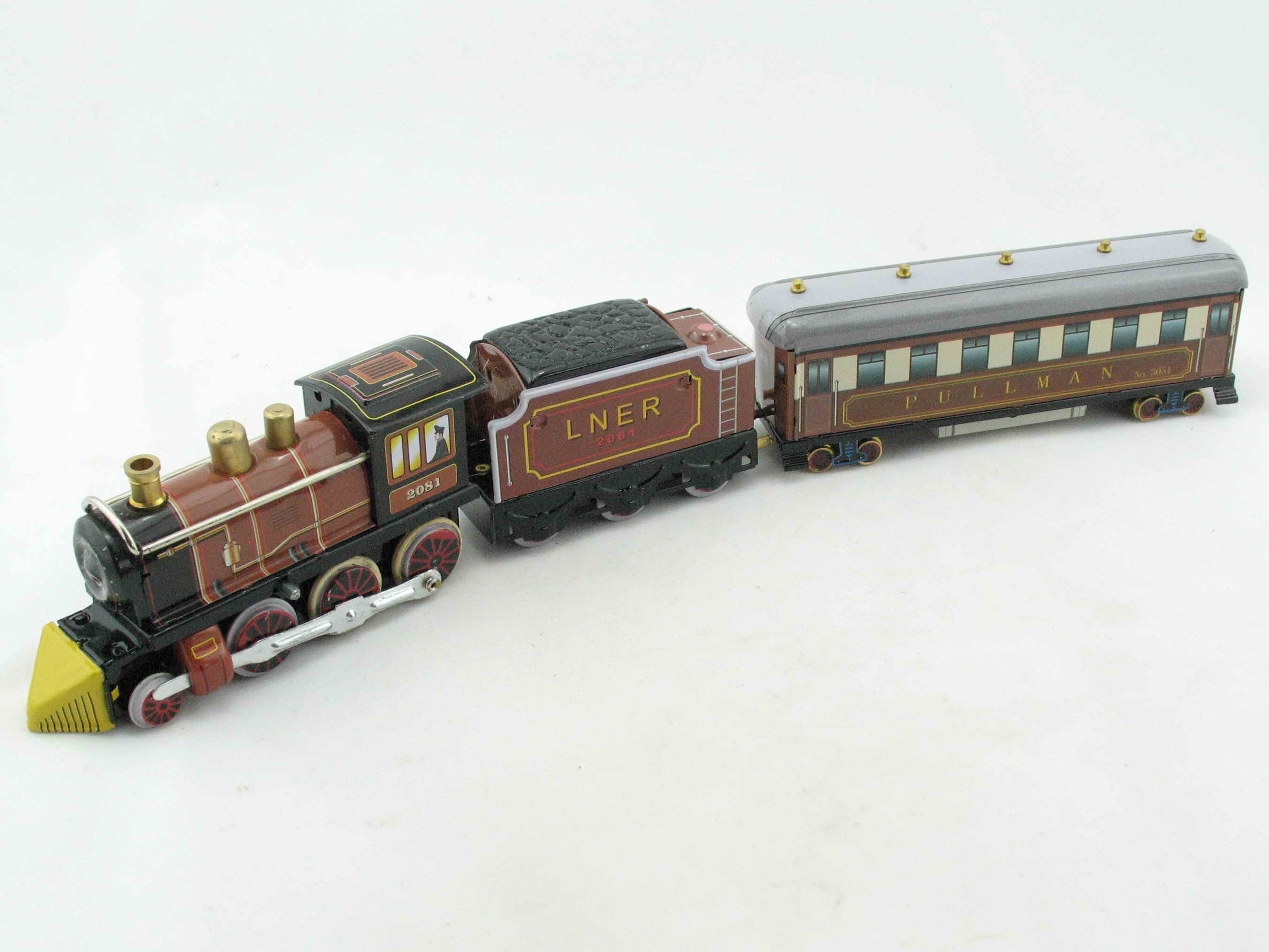 Blechspielzeug - Dampflok mit Tender und Personenwagen braun
