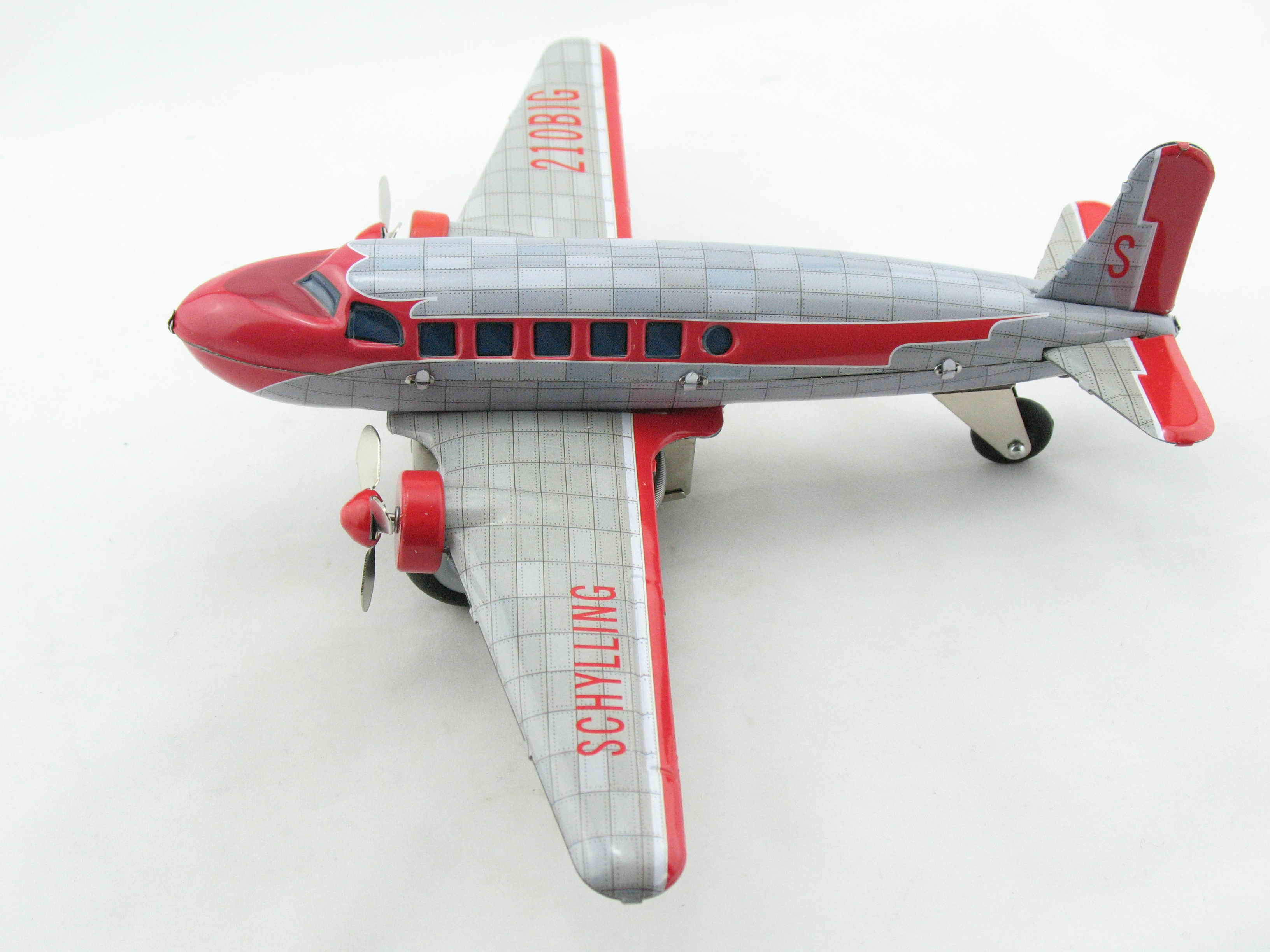Blechspielzeug - Flugzeug DC3 mit Friktion silber/rot