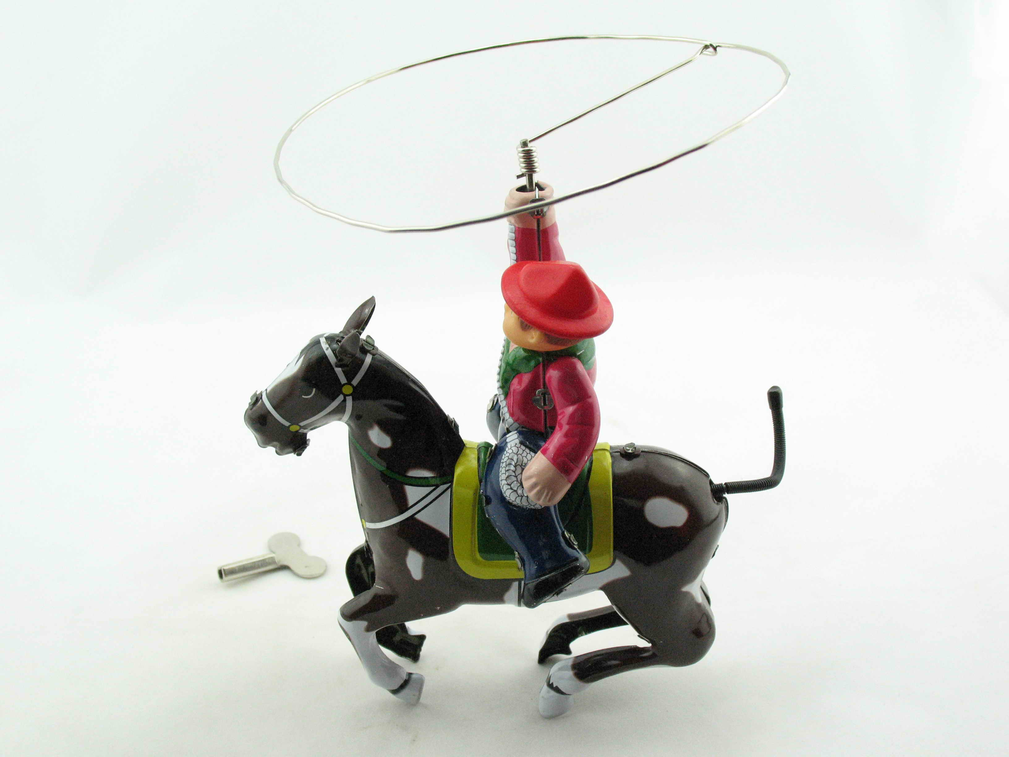 Blechspielzeug - Cowboy auf Pferd mit Lasso