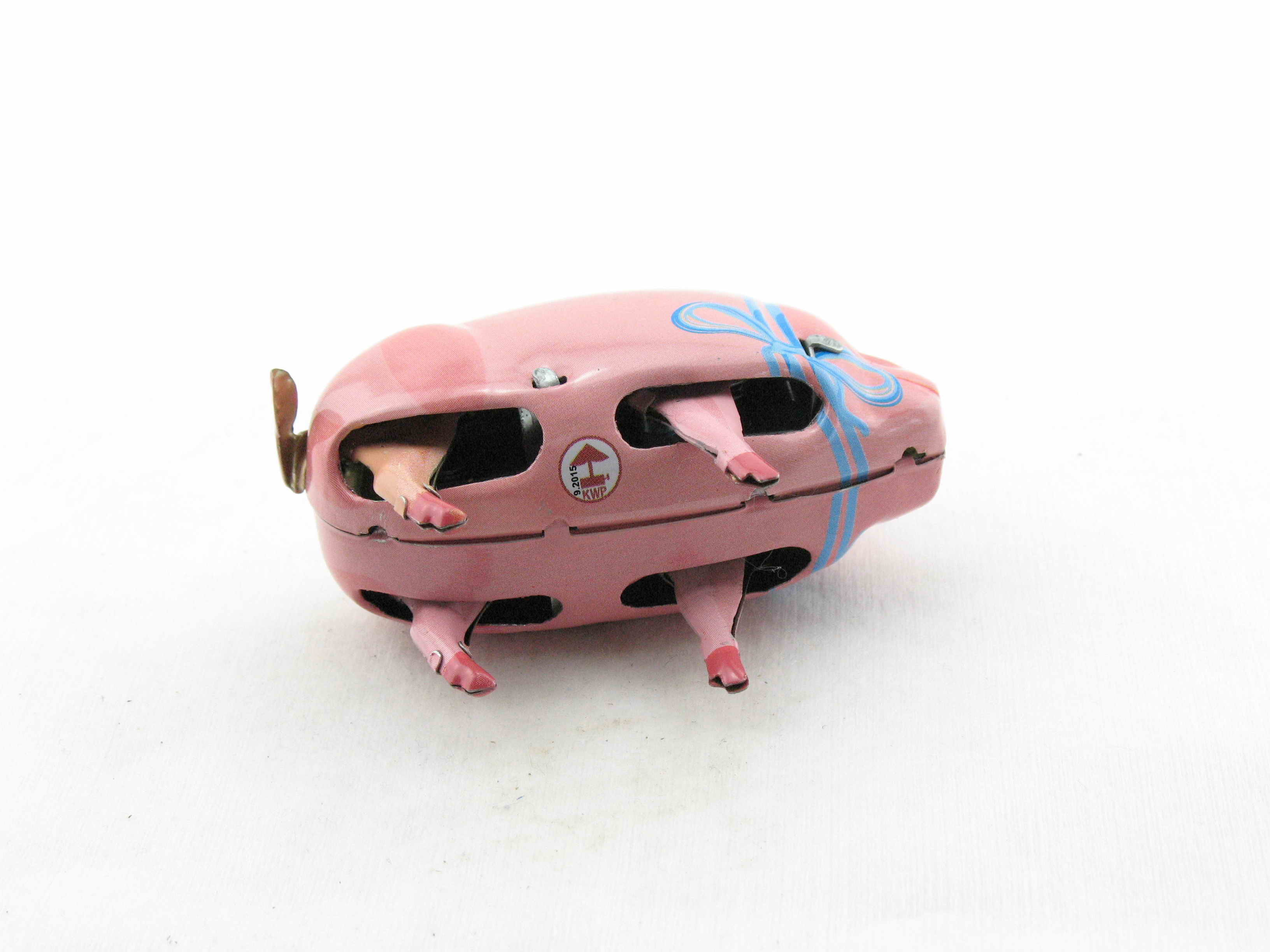 Blechspielzeug - Schwein Polly mit blauer Schleife