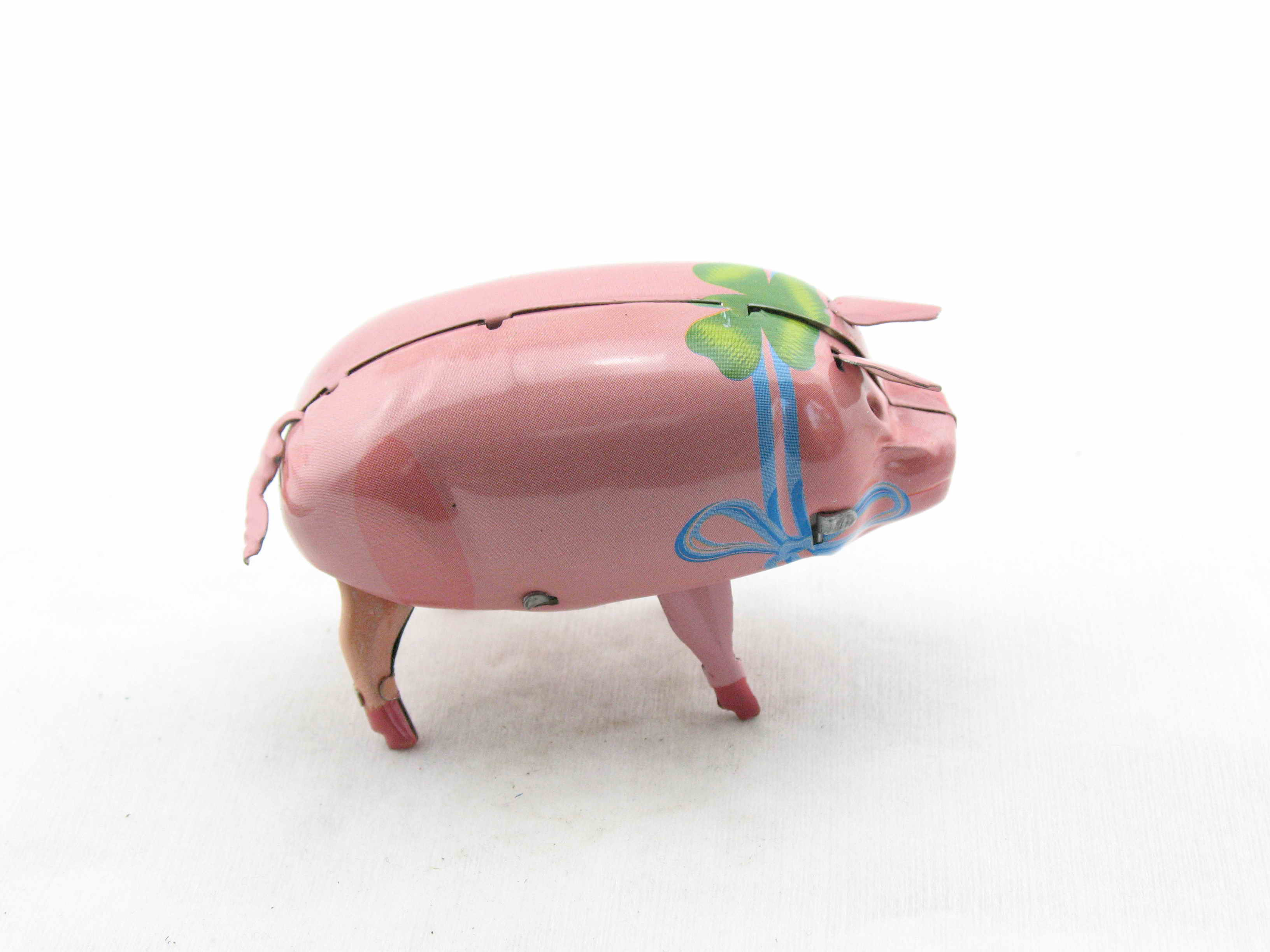 Blechspielzeug - Schwein Polly mit blauer Schleife