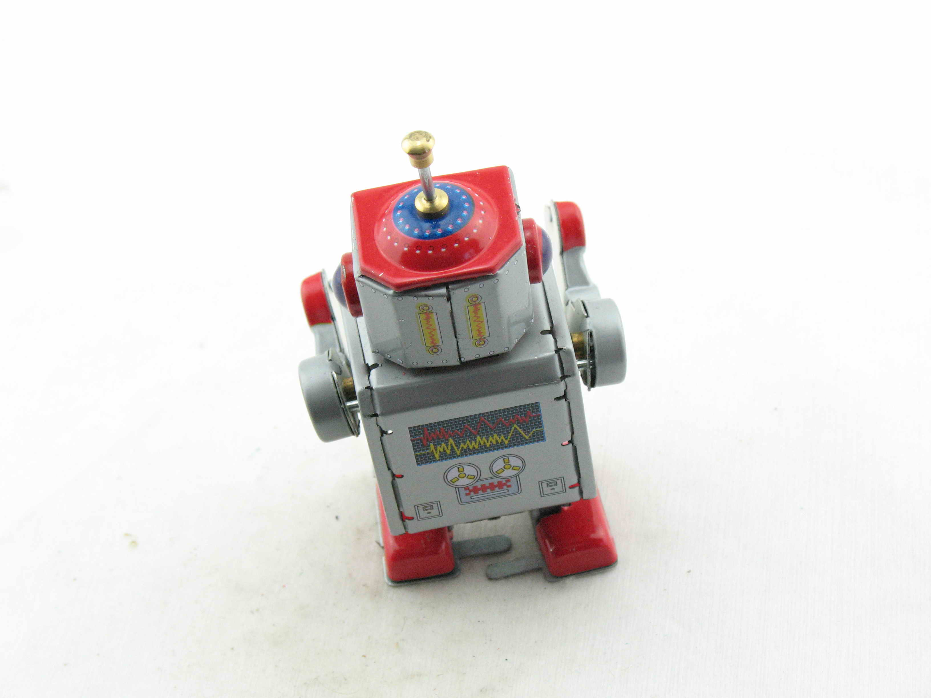 Blechspielzeug - Roboter, 10 cm silber/rot