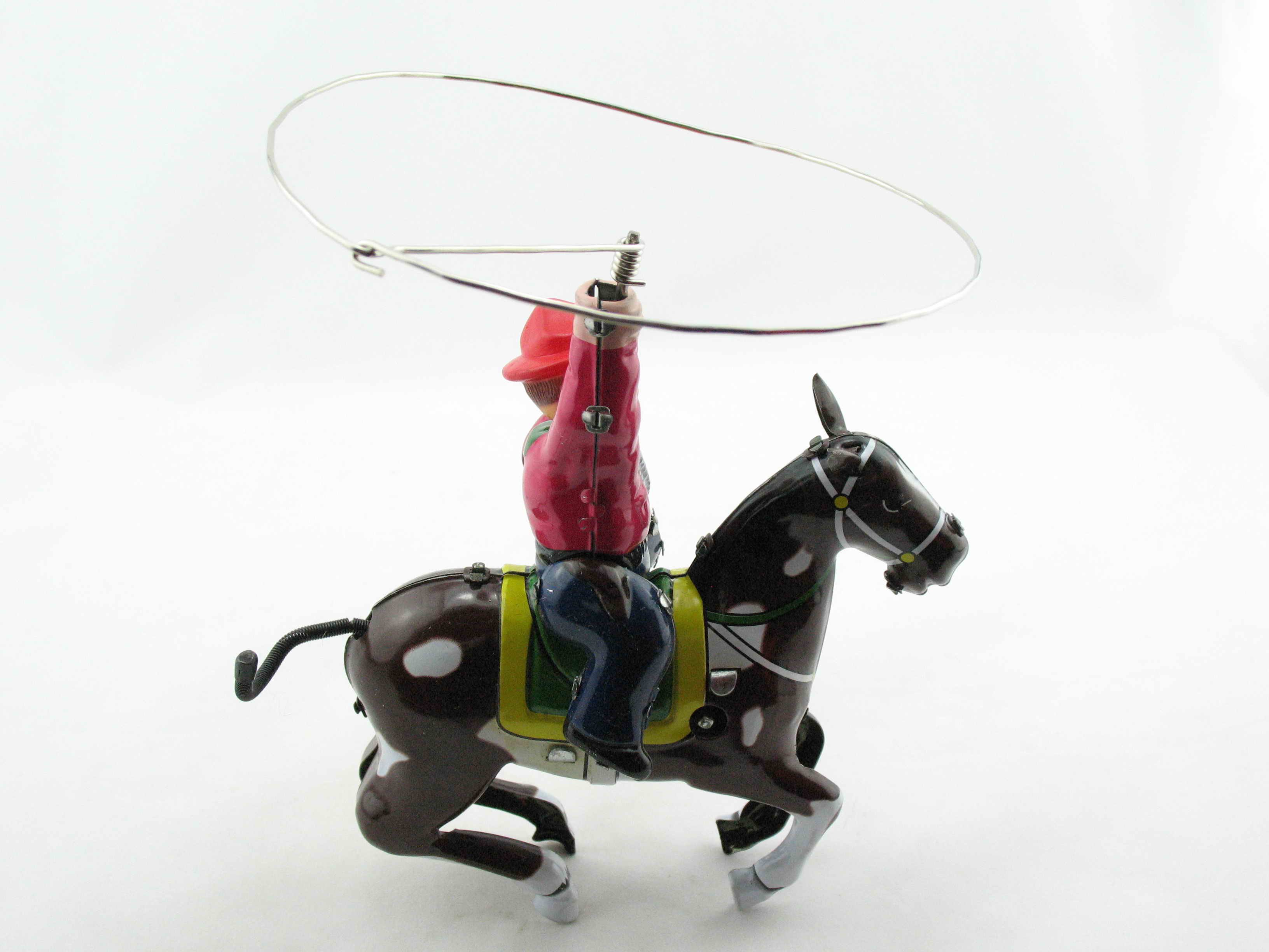 Blechspielzeug - Cowboy auf Pferd mit Lasso